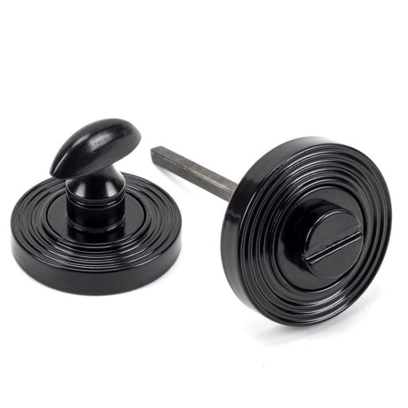 This is an image of From The Anvil - Black Round Thumbturn Set (Beehive) available to order from T.H Wiggans Architectural Ironmongery in Kendal, quick delivery and discounted prices.