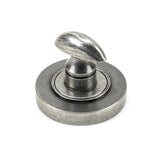 This is an image showing From The Anvil - Pewter Round Thumbturn Set (Plain) available from trade door handles, quick delivery and discounted prices