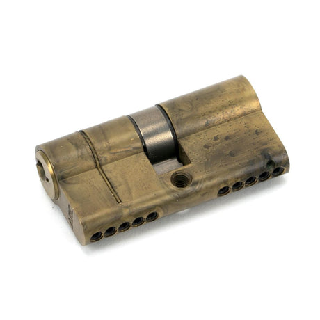 This is an image showing From The Anvil - Aged Brass 30/30 5pin Euro Cylinder KA available from T.H Wiggans Architectural Ironmongery in Kendal, quick delivery and discounted prices