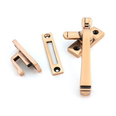 This is an image showing From The Anvil - Polished Bronze Locking Avon Fastener available from T.H Wiggans Architectural Ironmongery in Kendal, quick delivery and discounted prices
