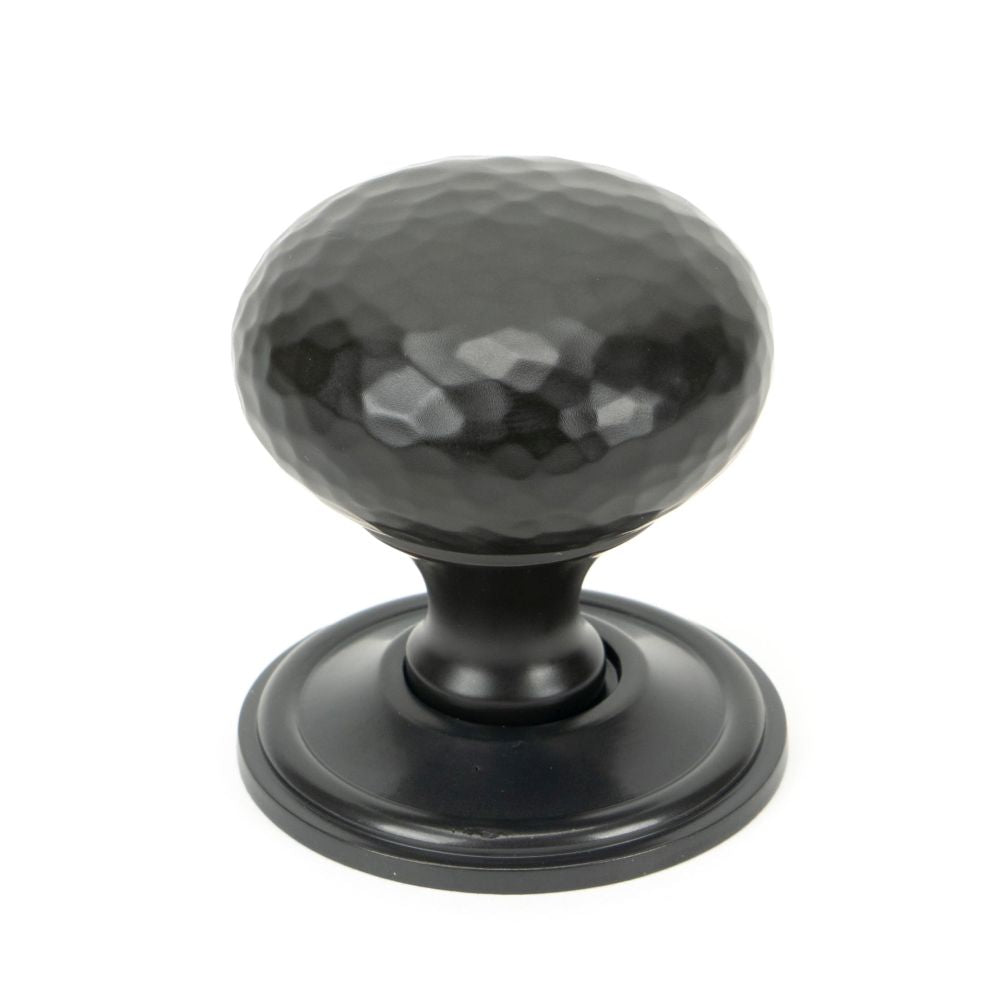 This is an image showing From The Anvil - Aged Bronze Hammered Mushroom Cabinet Knob 38mm available from T.H Wiggans Architectural Ironmongery in Kendal, quick delivery and discounted prices