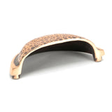 This is an image showing From The Anvil - Polished Bronze Hammered Regency Concealed Drawer Pull available from trade door handles, quick delivery and discounted prices