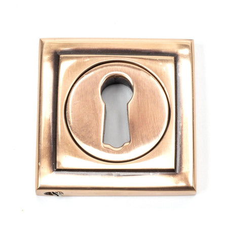 This is an image of From The Anvil - Polished Bronze Round Escutcheon (Square) available to order from T.H Wiggans Architectural Ironmongery in Kendal, quick delivery and discounted prices.