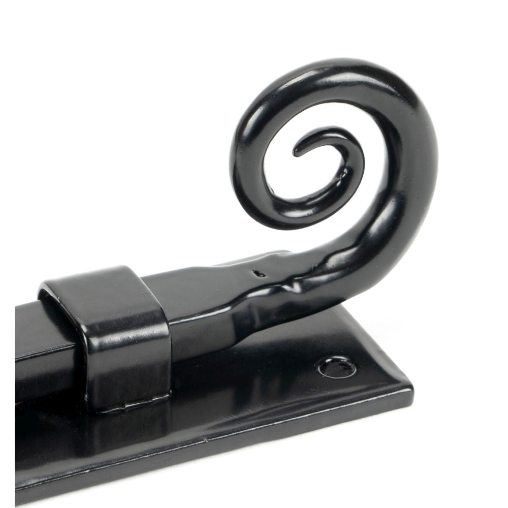 This is an image showing From The Anvil - Black 4" Monkeytail Universal Bolt available from trade door handles, quick delivery and discounted prices