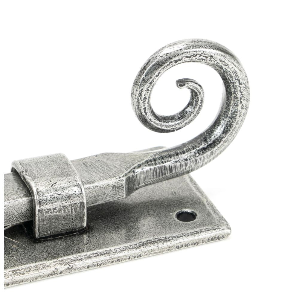 This is an image showing From The Anvil - Pewter 4" Monkeytail Universal Bolt available from trade door handles, quick delivery and discounted prices