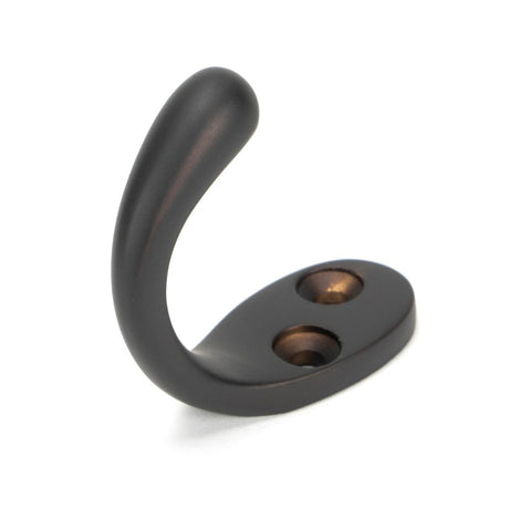 This is an image showing From The Anvil - Aged Bronze Celtic Single Robe Hook available from T.H Wiggans Architectural Ironmongery in Kendal, quick delivery and discounted prices