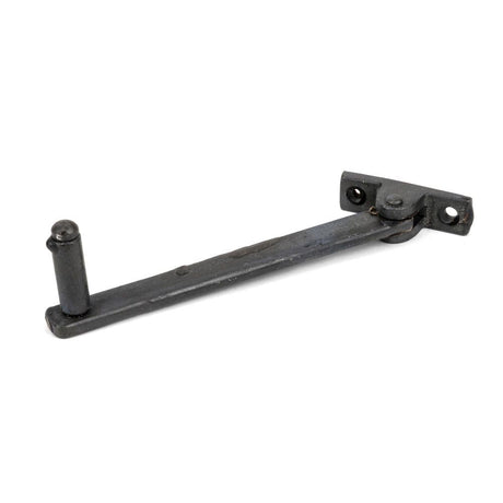 This is an image showing From The Anvil - Beeswax 6" Roller Arm Stay available from T.H Wiggans Architectural Ironmongery in Kendal, quick delivery and discounted prices