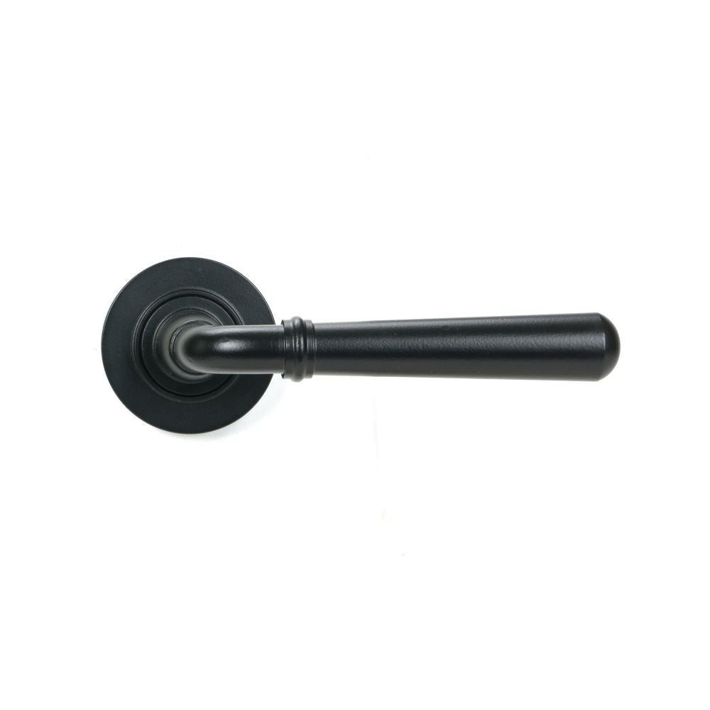 This is an image showing From The Anvil - Matt Black Newbury Lever on Rose Set (Plain) available from trade door handles, quick delivery and discounted prices