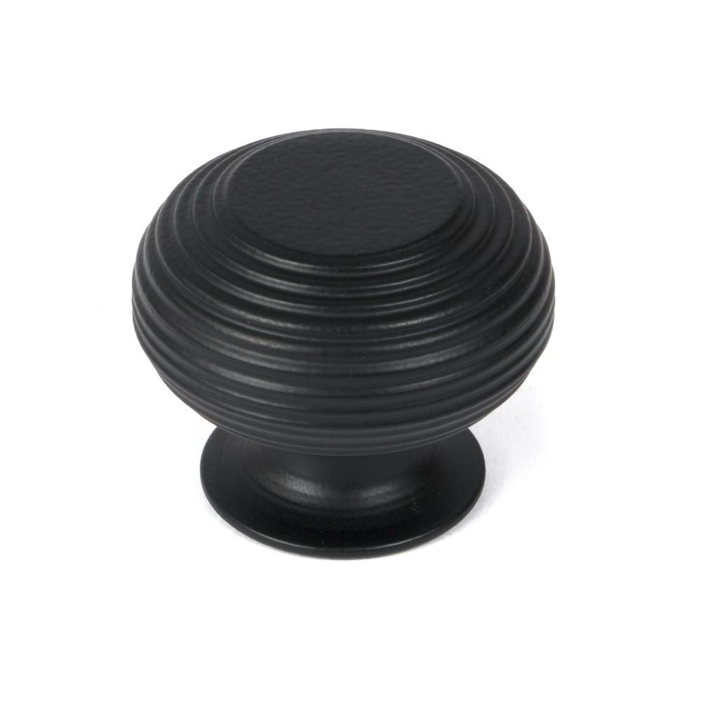 This is an image showing From The Anvil - Matt Black Beehive Cabinet Knob 40mm available from T.H Wiggans Architectural Ironmongery in Kendal, quick delivery and discounted prices