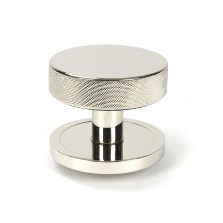This is an image of From The Anvil - Polished Nickel Brompton Centre Door Knob (Plain) available to order from T.H Wiggans Architectural Ironmongery in Kendal, quick delivery and discounted prices.