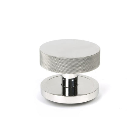 This is an image of From The Anvil - Polished Marine SS (316) Brompton Centre Door Knob (Plain) available to order from T.H Wiggans Architectural Ironmongery in Kendal, quick delivery and discounted prices.