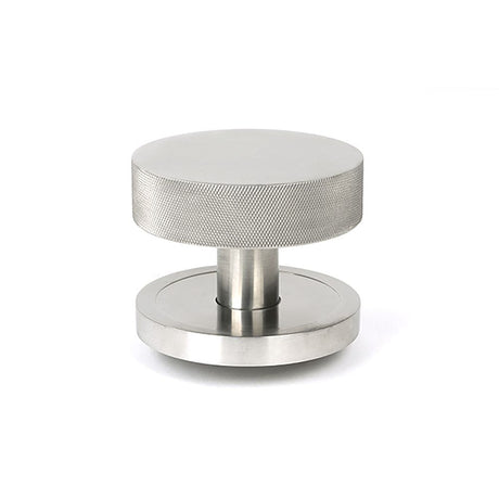 This is an image of From The Anvil - Satin Marine SS (316) Brompton Centre Door Knob (Plain) available to order from T.H Wiggans Architectural Ironmongery in Kendal, quick delivery and discounted prices.