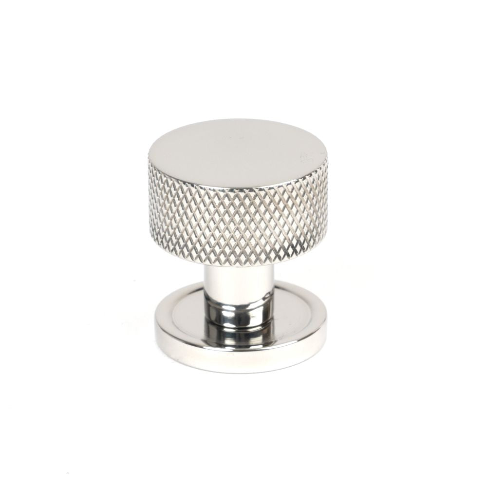 This is an image showing From The Anvil - Polished SS (304) Brompton Cabinet Knob - 25mm (Plain) available from T.H Wiggans Architectural Ironmongery in Kendal, quick delivery and discounted prices