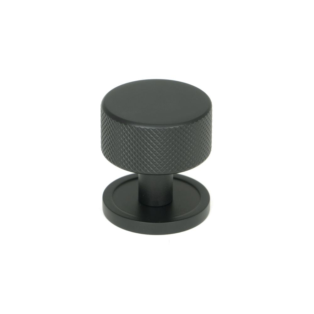 This is an image showing From The Anvil - Matt Black Brompton Cabinet Knob - 32mm (Plain) available from T.H Wiggans Architectural Ironmongery in Kendal, quick delivery and discounted prices