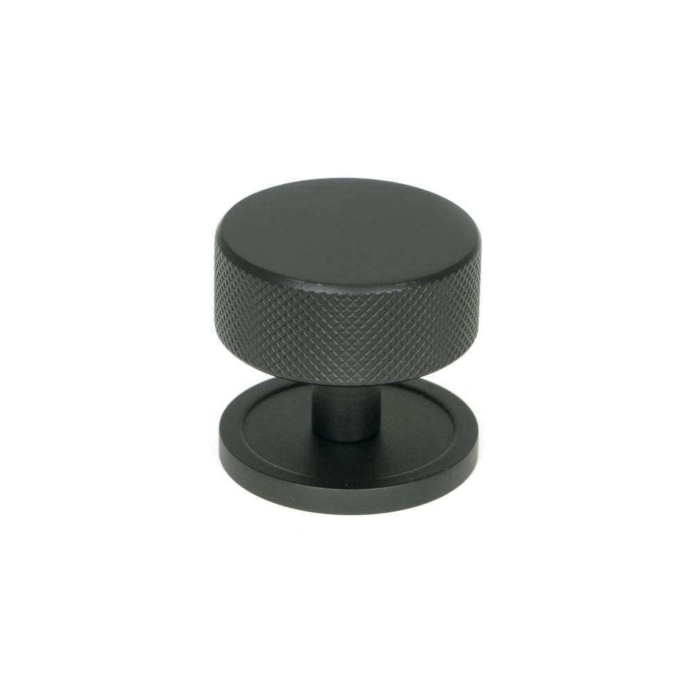 This is an image showing From The Anvil - Matt Black Brompton Cabinet Knob - 38mm (Plain) available from T.H Wiggans Architectural Ironmongery in Kendal, quick delivery and discounted prices