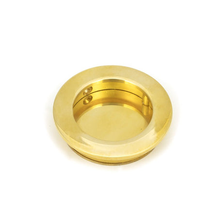 This is an image of From The Anvil - Polished Brass 60mm Plain Round Pull available to order from T.H Wiggans Architectural Ironmongery in Kendal, quick delivery and discounted prices.