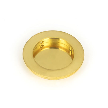 This is an image of From The Anvil - Polished Brass 75mm Plain Round Pull available to order from T.H Wiggans Architectural Ironmongery in Kendal, quick delivery and discounted prices.