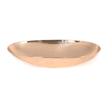 This is an image showing From The Anvil - Hammered Copper Oval Sink available from T.H Wiggans Architectural Ironmongery in Kendal, quick delivery and discounted prices