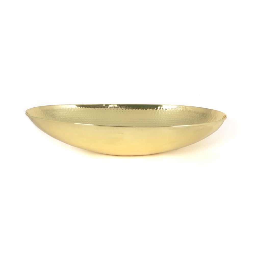 This is an image showing From The Anvil - Hammered Brass Oval Sink available from T.H Wiggans Architectural Ironmongery in Kendal, quick delivery and discounted prices
