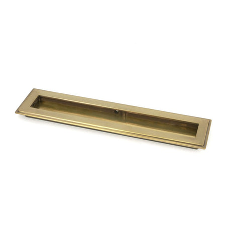 This is an image of From The Anvil - Aged Brass 250mm Art Deco Rectangular Pull available to order from T.H Wiggans Architectural Ironmongery in Kendal, quick delivery and discounted prices.
