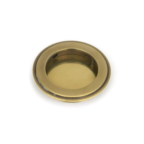 This is an image of From The Anvil - Aged Brass 75mm Art Deco Round Pull available to order from T.H Wiggans Architectural Ironmongery in Kendal, quick delivery and discounted prices.