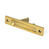 This is an image of From The Anvil - Aged Brass 125mm x 25mm Edge Pull available to order from T.H Wiggans Architectural Ironmongery in Kendal, quick delivery and discounted prices.