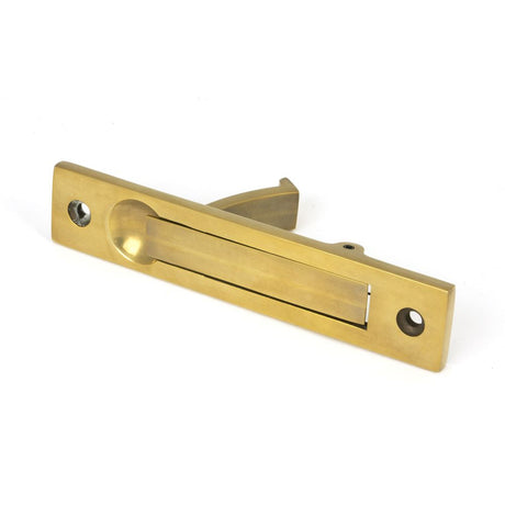 This is an image of From The Anvil - Aged Brass 125mm x 25mm Edge Pull available to order from T.H Wiggans Architectural Ironmongery in Kendal, quick delivery and discounted prices.