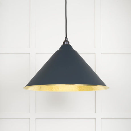 This is an image showing From The Anvil - Hammered Brass Hockley Pendant in Soot available from T.H Wiggans Architectural Ironmongery in Kendal, quick delivery and discounted prices