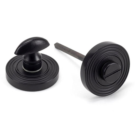 This is an image of From The Anvil - Matt Black Round Thumbturn Set (Beehive) available to order from T.H Wiggans Architectural Ironmongery in Kendal, quick delivery and discounted prices.