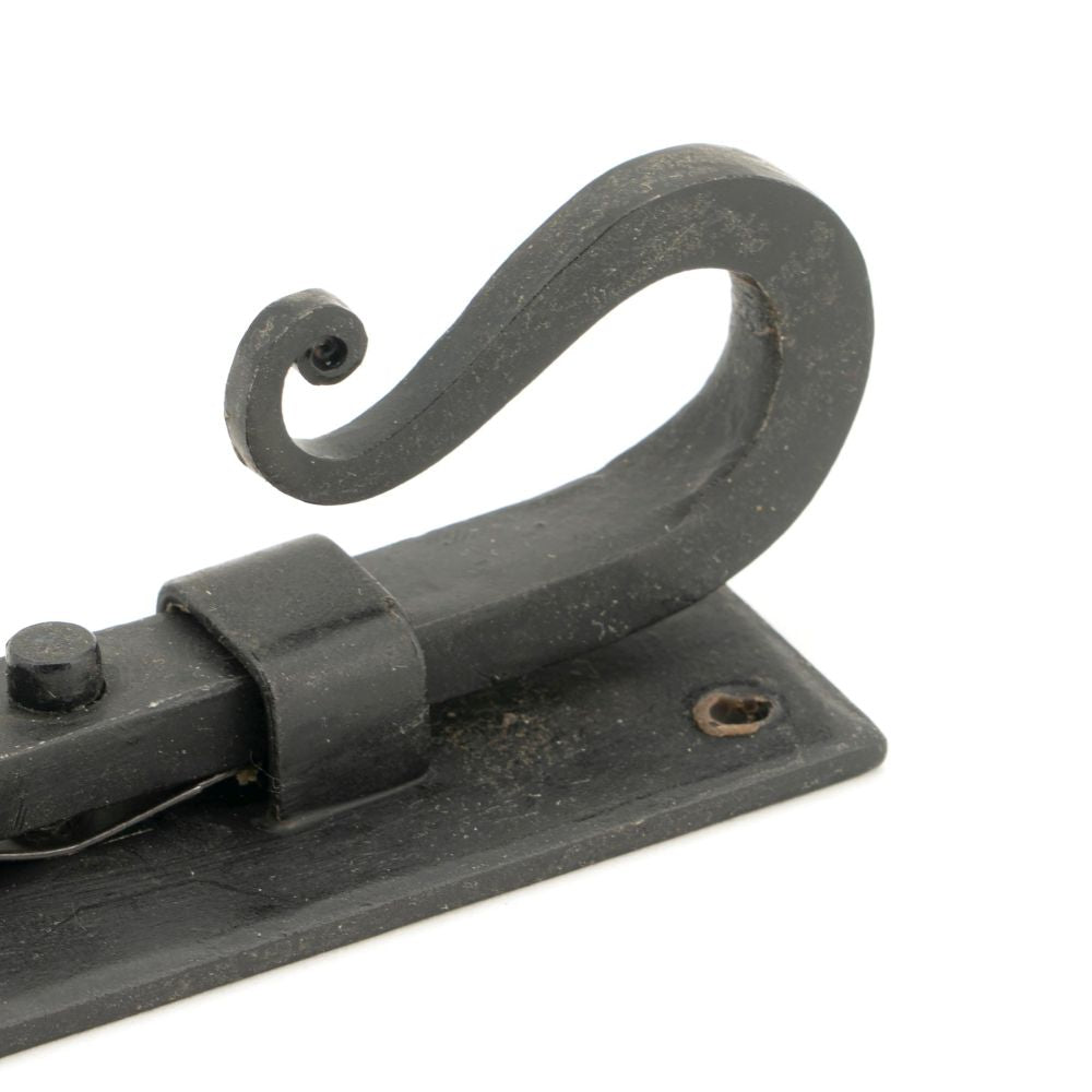 This is an image showing From The Anvil - External Beeswax 4" Shepherd's Crook Universal Bolt available from trade door handles, quick delivery and discounted prices