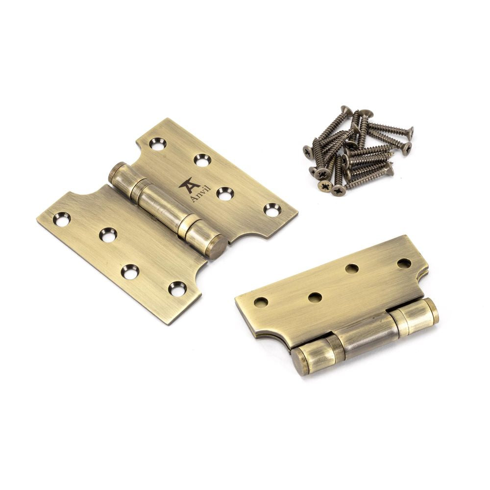 This is an image showing From The Anvil - Aged Brass 4" x 2" x 4" Parliament Hinge (pair) ss available from T.H Wiggans Architectural Ironmongery, quick delivery and discounted prices