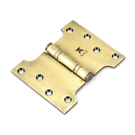 This is an image showing From The Anvil - Aged Brass 4" x 3" x 5" Parliament Hinge (pair) ss available from T.H Wiggans Architectural Ironmongery in Kendal, quick delivery and discounted prices
