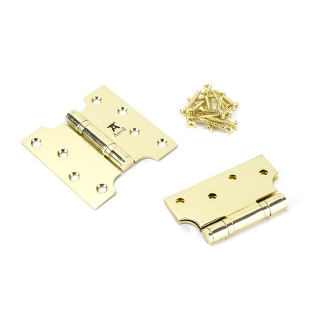 This is an image showing From The Anvil - Polished Brass 4" x 2" x 4" Parliament Hinge (pair) ss available from T.H Wiggans Architectural Ironmongery, quick delivery and discounted prices