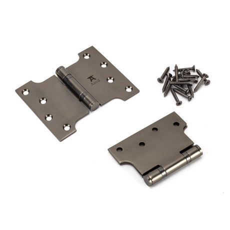 This is an image showing From The Anvil - Aged Bronze 4" x 3" x 5" Parliament Hinge (pair) ss available from T.H Wiggans Architectural Ironmongery, quick delivery and discounted prices
