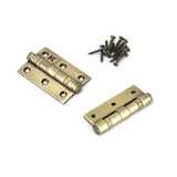 This is an image showing From The Anvil - Aged Brass 3" Ball Bearing Butt Hinge (pair) ss available from T.H Wiggans Architectural Ironmongery, quick delivery and discounted prices