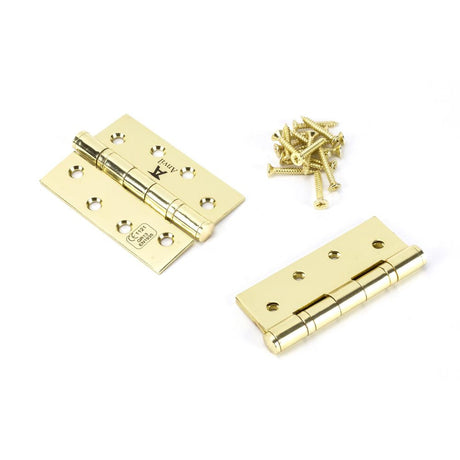 This is an image showing From The Anvil - Polished Brass 4" Ball Bearing Butt Hinge (pair) ss available from T.H Wiggans Architectural Ironmongery, quick delivery and discounted prices