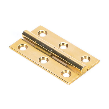 This is an image showing From The Anvil - Polished Brass 2" Butt Hinge (pair) available from T.H Wiggans Architectural Ironmongery in Kendal, quick delivery and discounted prices