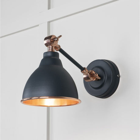 This is an image showing From The Anvil - Smooth Copper Brindley Wall Light in Soot available from T.H Wiggans Architectural Ironmongery in Kendal, quick delivery and discounted prices