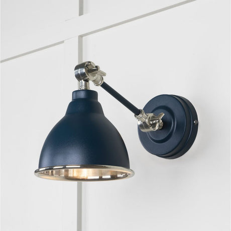 This is an image showing From The Anvil - Smooth Nickel Brindley Wall Light in Dusk available from T.H Wiggans Architectural Ironmongery in Kendal, quick delivery and discounted prices