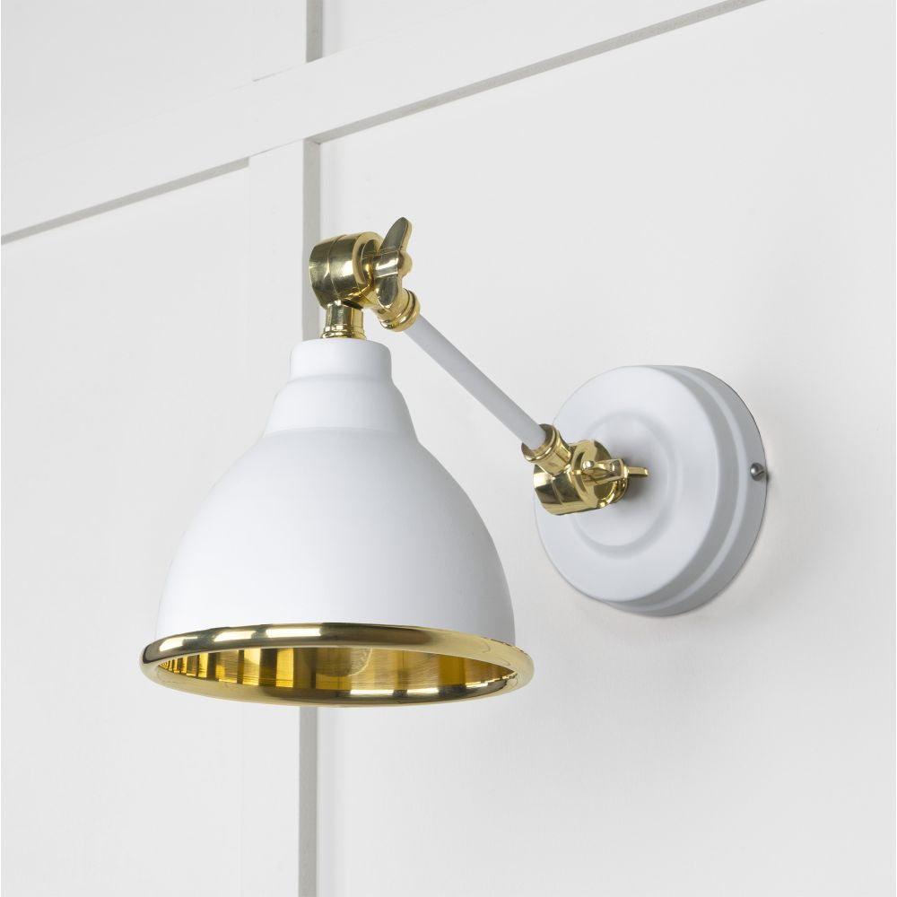 This is an image showing From The Anvil - Smooth Brass Brindley Wall Light in Flock available from T.H Wiggans Architectural Ironmongery in Kendal, quick delivery and discounted prices