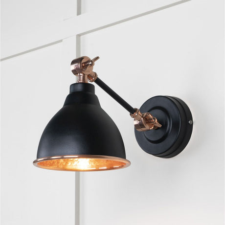This is an image showing From The Anvil - Hammered Copper Brindley Wall Light in Elan Black available from T.H Wiggans Architectural Ironmongery in Kendal, quick delivery and discounted prices