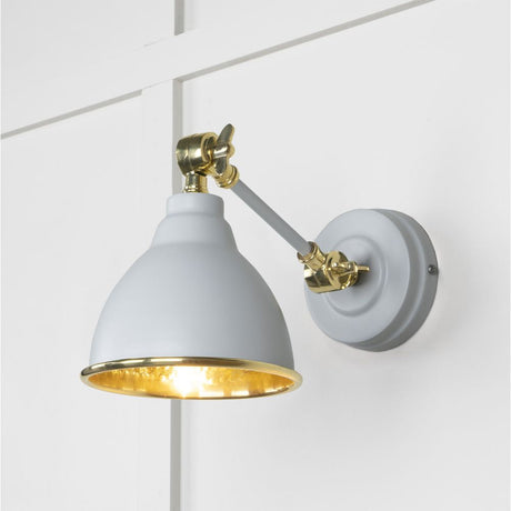 This is an image showing From The Anvil - Hammered Brass Brindley Wall Light in Birch available from T.H Wiggans Architectural Ironmongery in Kendal, quick delivery and discounted prices