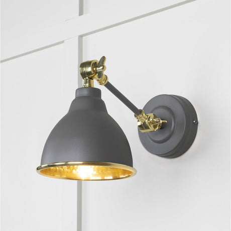 This is an image showing From The Anvil - Hammered Brass Brindley Wall Light in Bluff available from T.H Wiggans Architectural Ironmongery in Kendal, quick delivery and discounted prices