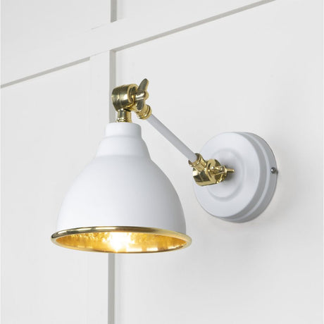 This is an image showing From The Anvil - Hammered Brass Brindley Wall Light in Flock available from T.H Wiggans Architectural Ironmongery in Kendal, quick delivery and discounted prices