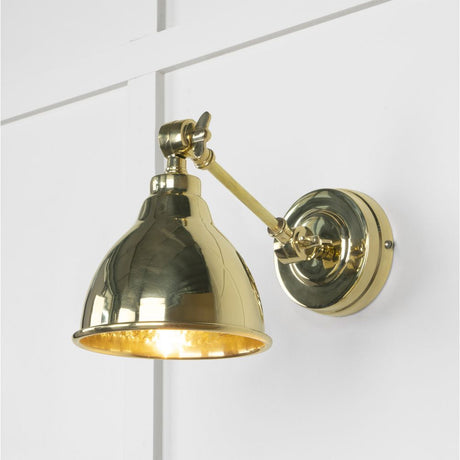 This is an image showing From The Anvil - Hammered Brass Brindley Wall Light available from T.H Wiggans Architectural Ironmongery in Kendal, quick delivery and discounted prices