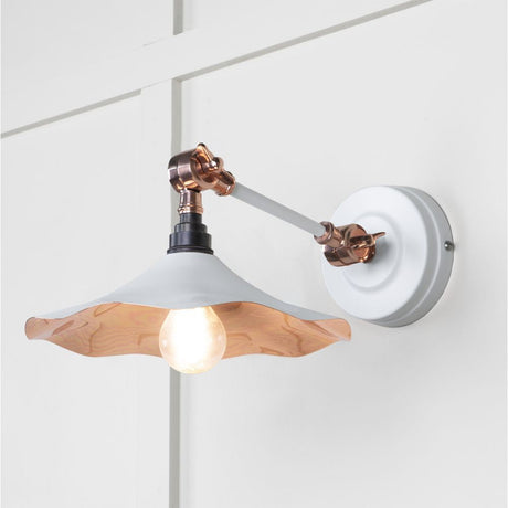 This is an image showing From The Anvil - Smooth Copper Flora Wall Light in Flock available from T.H Wiggans Architectural Ironmongery in Kendal, quick delivery and discounted prices