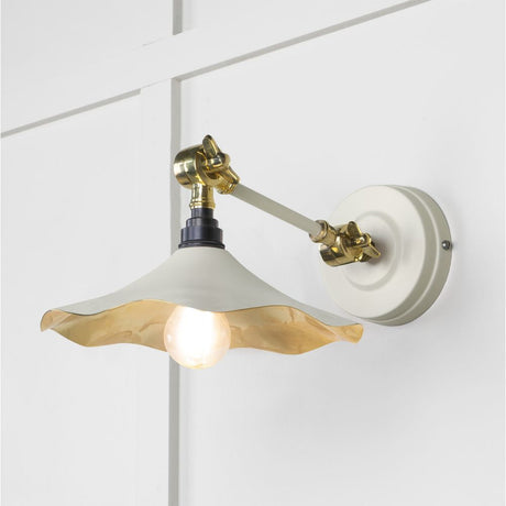 This is an image showing From The Anvil - Smooth Brass Flora Wall Light in Teasel available from T.H Wiggans Architectural Ironmongery in Kendal, quick delivery and discounted prices