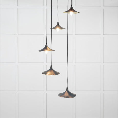 This is an image showing From The Anvil - Smooth Brass Flora Cluster Pendant in Dusk available from T.H Wiggans Architectural Ironmongery in Kendal, quick delivery and discounted prices