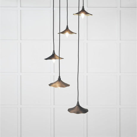 This is an image showing From The Anvil - Smooth Brass Flora Cluster Pendant in Soot available from T.H Wiggans Architectural Ironmongery in Kendal, quick delivery and discounted prices