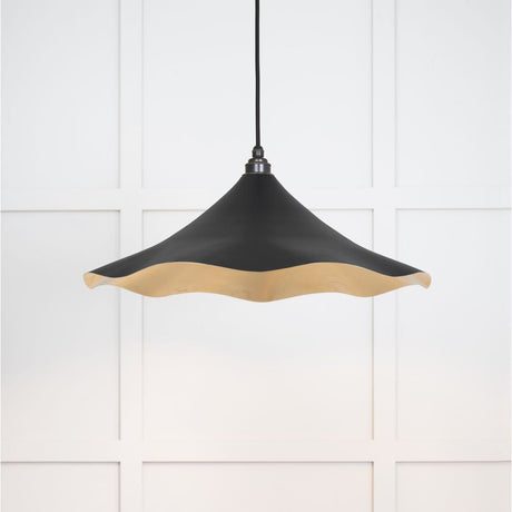 This is an image showing From The Anvil - Smooth Brass Flora Pendant in Elan Black available from T.H Wiggans Architectural Ironmongery in Kendal, quick delivery and discounted prices